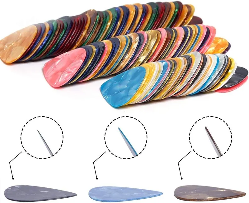 Augshy celluloid guitar picks in a 150 pack with thin, medium, and heavy gauge samples, one of the best guitar picks for beginners.