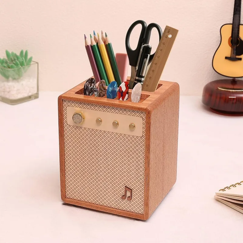 Brown Sapele-wood CoolGift Mart amp-shaped organizer shown holding pencils and scissors on a desktop.