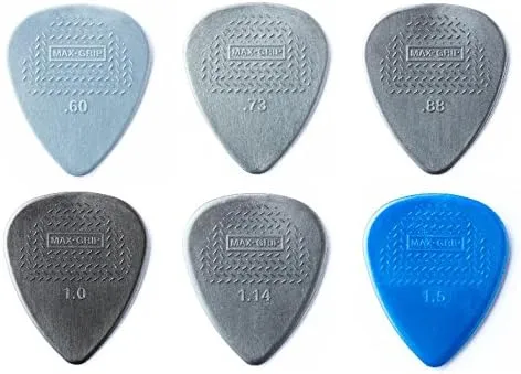 Dunlop Max Grip nylon picks in six gauges from light gray to dark with one blue pick, among the best guitar picks for beginners