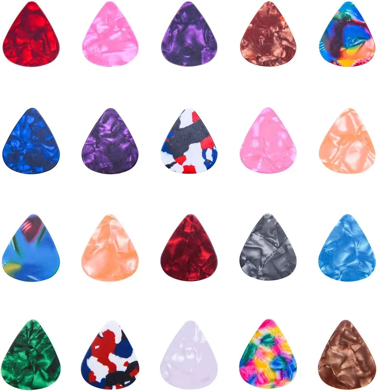 I-MART colorful thin guitar picks in assorted patterns laid out in a grid
