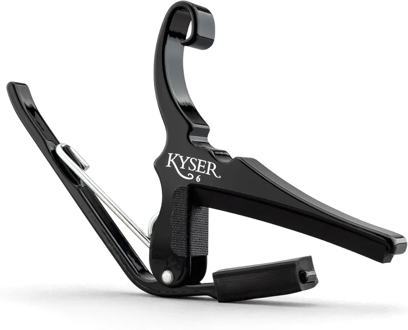 Kyser Quick-Change capo for six-string acoustic guitars in black.