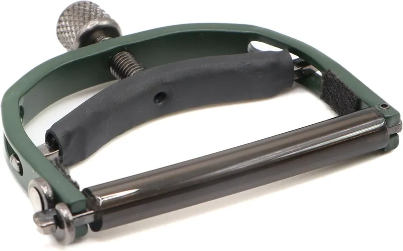 Paige six-string acoustic guitar capo in green, one of the best capos for acoustic guitar.